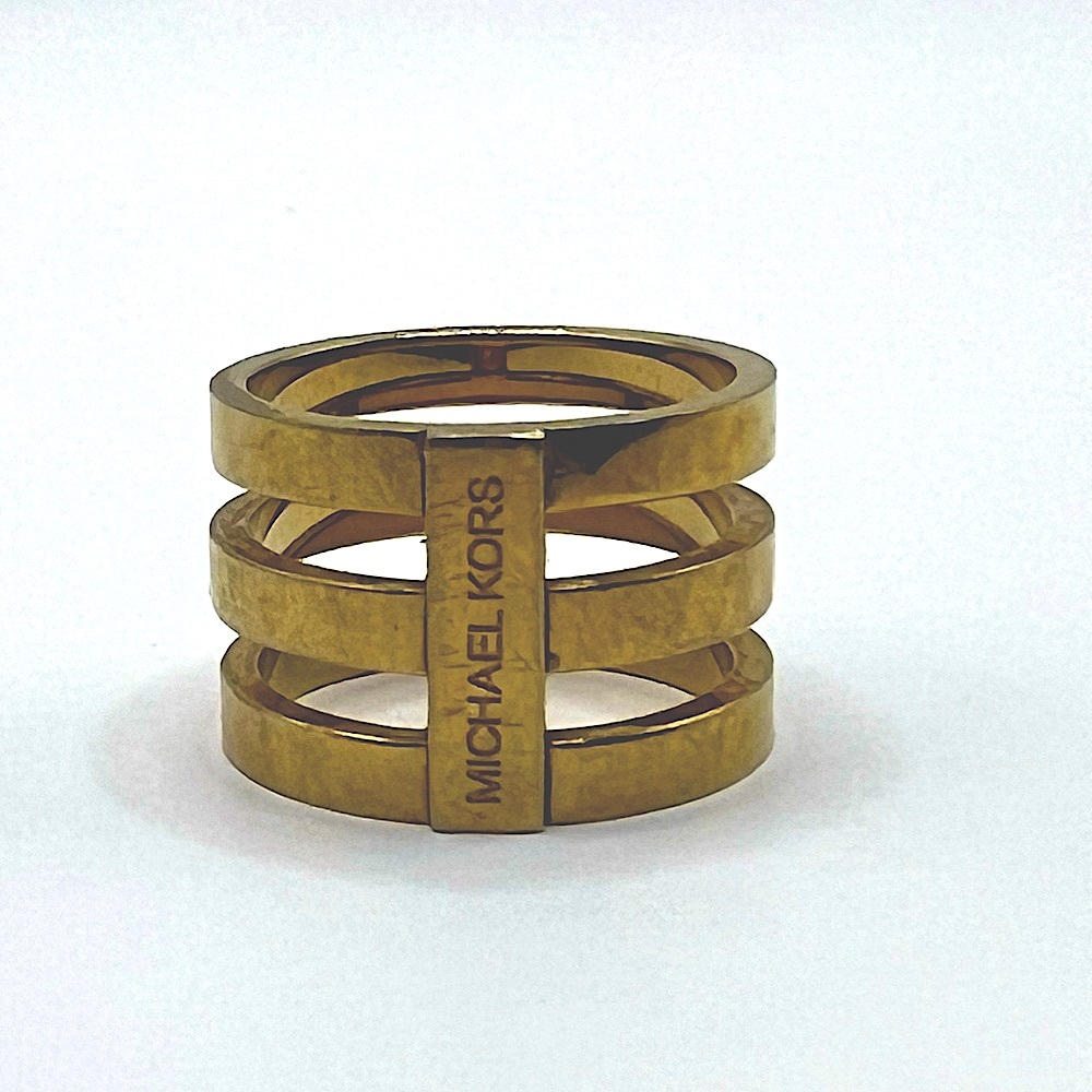Michael Kors Gold Tone Stack Ring. Tri-stack connected barrel ring